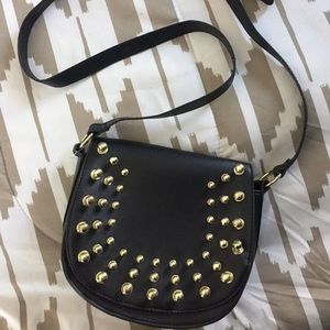 Gold studded clutchbag